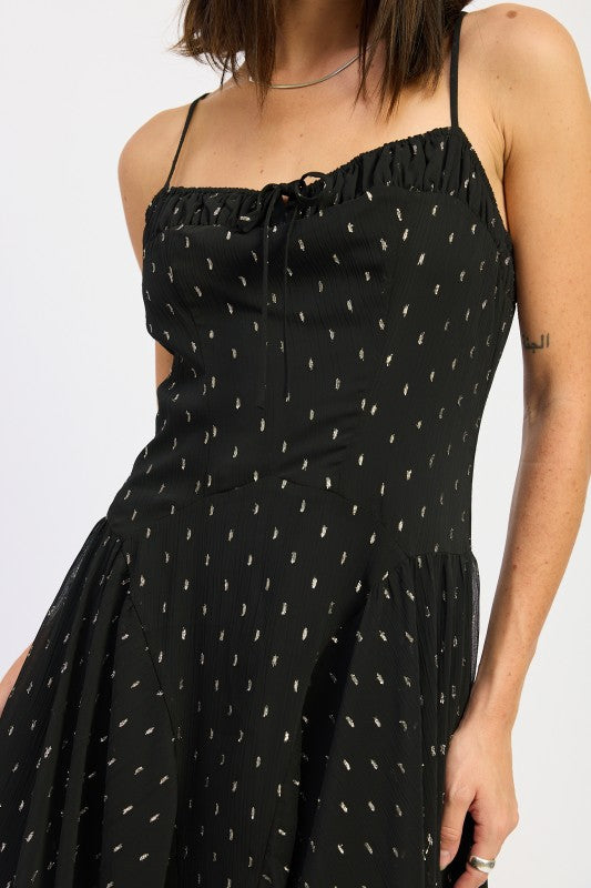 Emory Park Spaghetti Strap A-Line Maxi Dress in Black with a stylish ruffled hem and subtle print