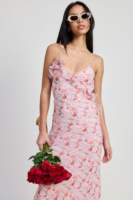 Emory Park Spaghetti Strap Maxi Dress in pink floral print worn by model holding a bouquet of red roses