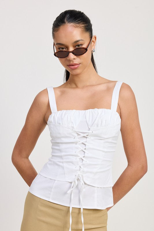 Emory Park white Square Neck Corset Top with lace-up front and wide straps on model