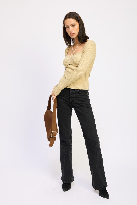 Emory Park Squared Neck Knit Top with Cut Out paired with black flared jeans for a stylish look