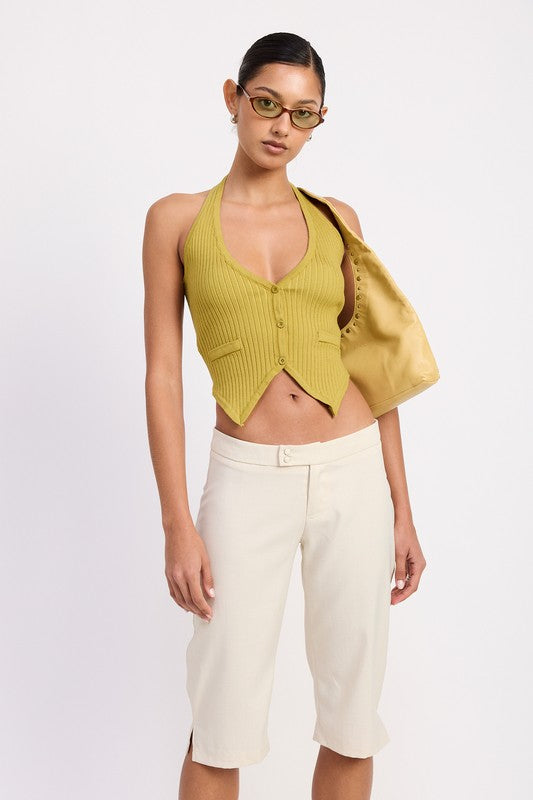 Emory Park Tailored Mid-Rise Bermuda Pants in cream on model with green halter top and jacket