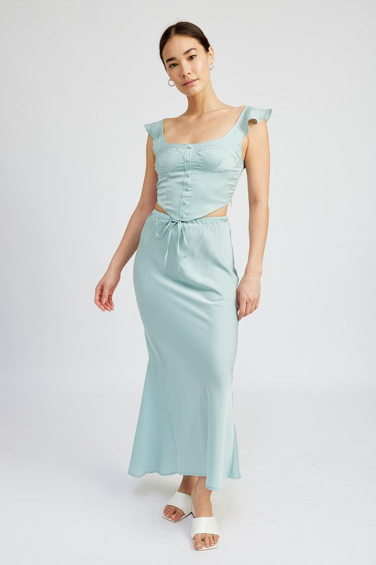 Emory Park Tie Front Satin Midi Skirt in light blue worn with matching top and white sandals