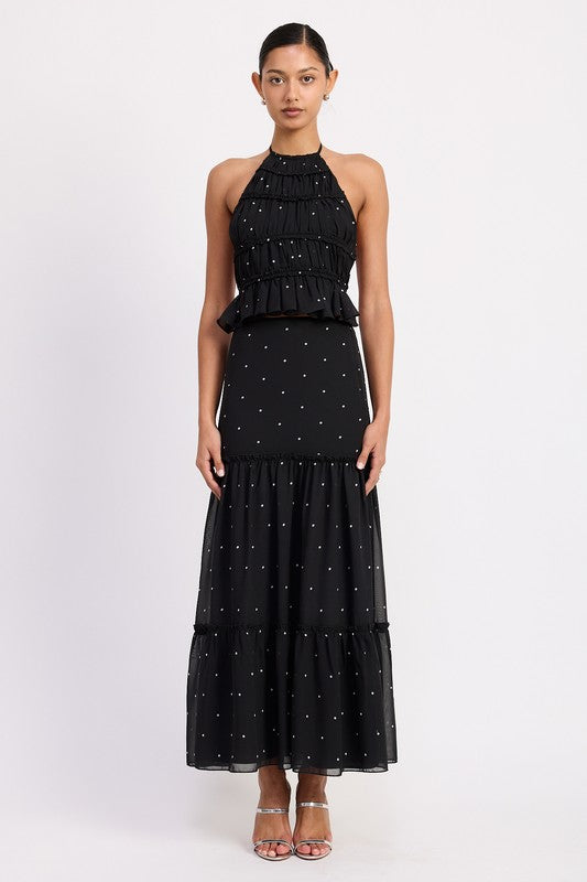 Emory Park black tiered ruffled midi skirt with white polka dots worn with matching halter top