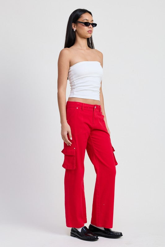 Emory Park red Pocket Cargo Pants worn by model with white tube top black loafers side flap pockets