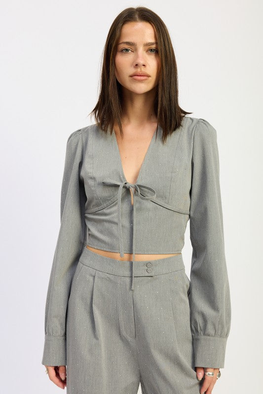 Emory Park V-Neck Cropped Blouse With Rhinestones in gray featuring a tie-front design and long sleeves