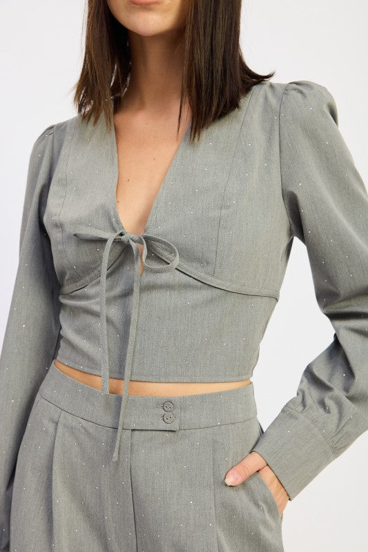 Emory Park V-Neck Cropped Blouse With Rhinestones in Gray with a tie detail and long sleeves