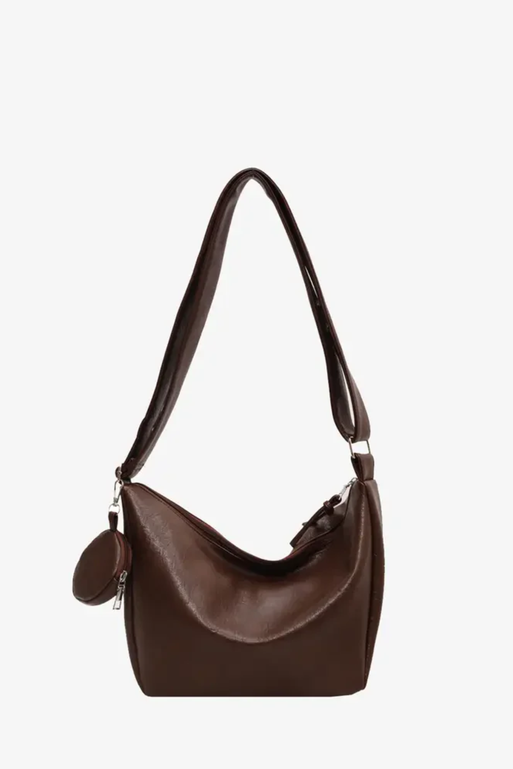 Vegan Leather Crossbody Bag in Brown with a stylish slouch design and a detachable coin pouch