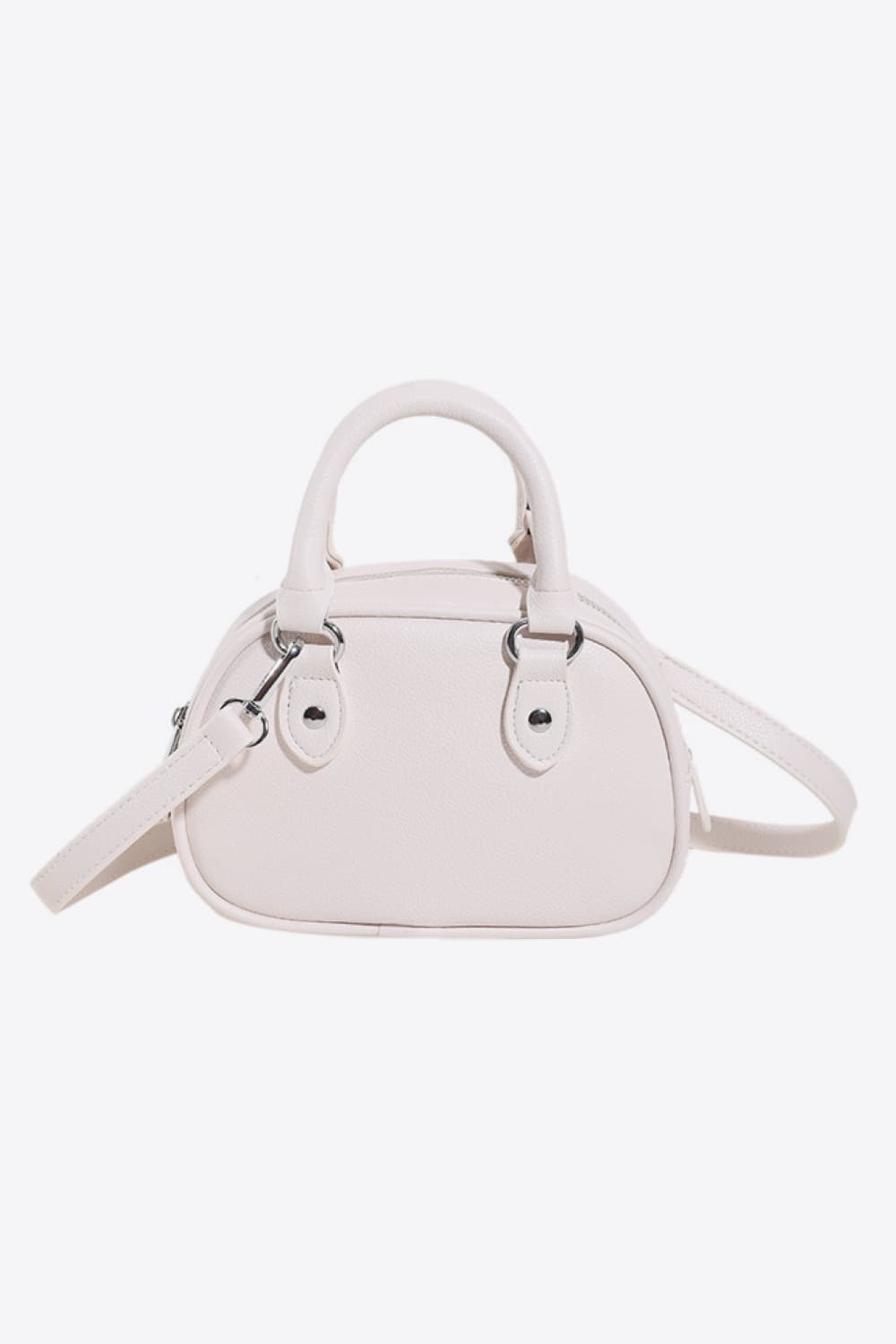 Vegan Leather Crossbody Bag in Light Pink with Adjustable Strap and Stylish Design
