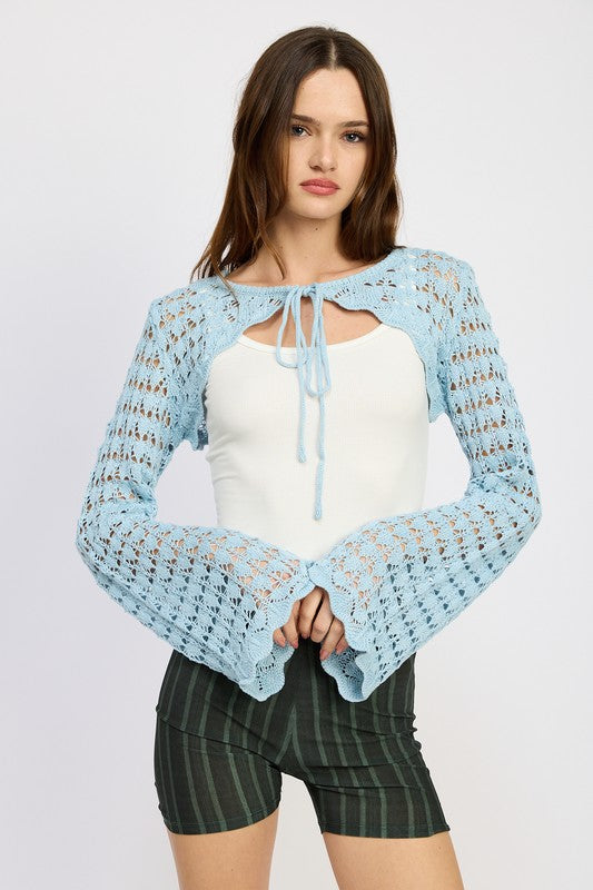 Emory Park light blue Crochet Bolero With Drawstrings featuring bell sleeves modeled with a white tank top and striped shorts