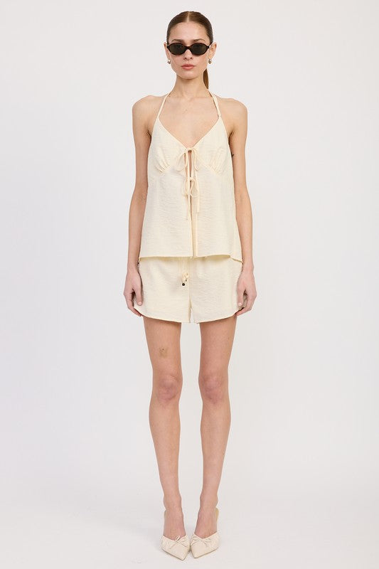 Emory Park cream Halter Neck Top with Back Tie worn by model paired with matching shorts