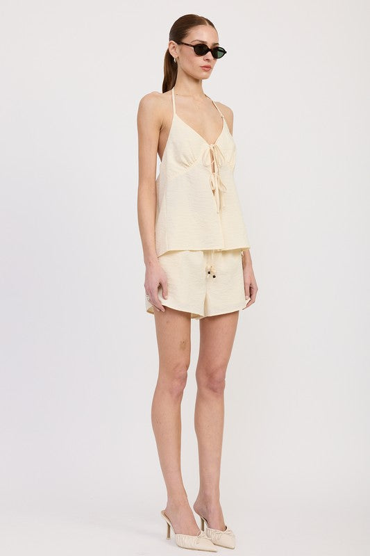 Emory Park Halter Neck Top with Back Tie in cream paired with matching shorts worn by model