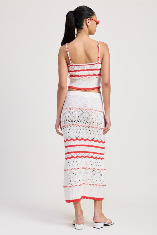 Emory Park Maxi Crochet Skirt in white and red worn by model with matching crop top and sandals