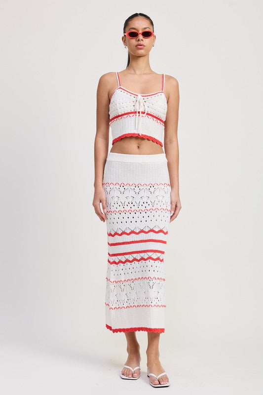 Emory Park white and red Maxi Crochet Skirt with intricate patterns worn by model with matching crop top and sunglasses