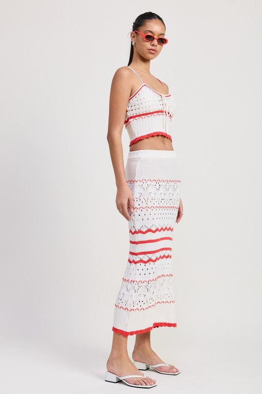 Emory Park Maxi Crochet Skirt in white with red accents worn with matching crop top and sandals