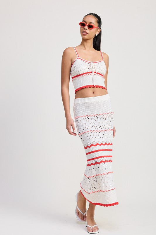 Emory Park white and red Maxi Crochet Skirt with intricate patterns worn with matching crop top and sandals