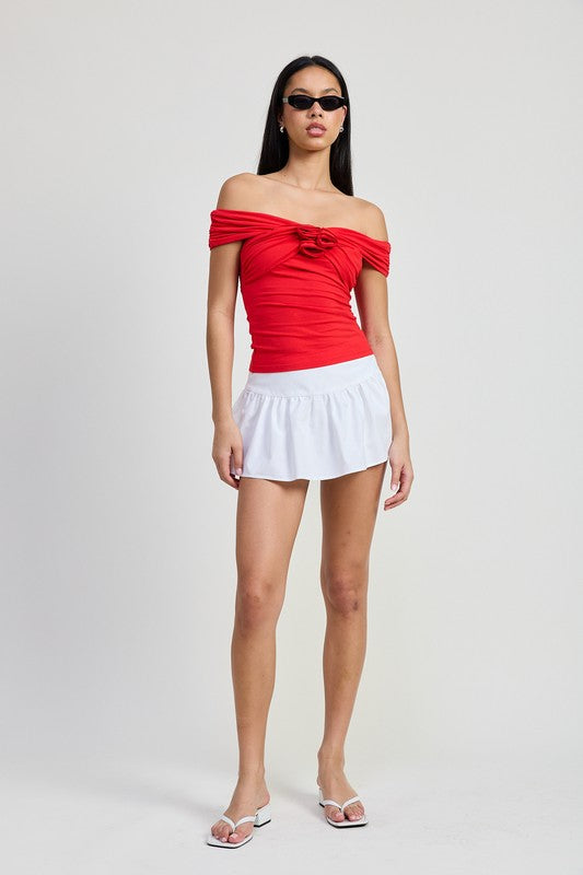 Emory Park Off Shoulder Rosette Top in red worn by model with white skirt and sunglasses