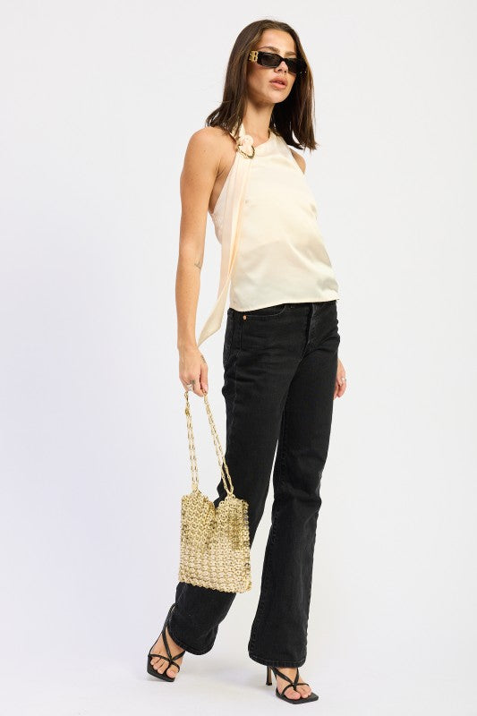 Emory Park One Shoulder Top With Scarf Detail in light hue styled with black jeans and a gold handbag