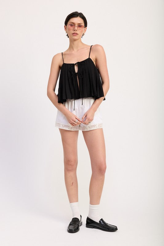 Emory Park black Pleated Tie Front Cami Top with spaghetti straps worn with white shorts
