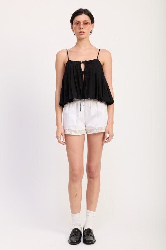 Emory Park Pleated Tie Front Cami Top in black worn with white shorts and black shoes