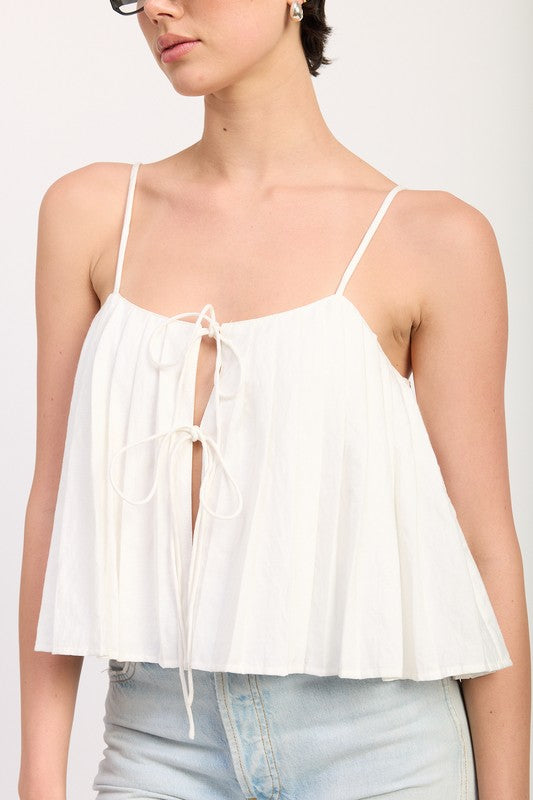 Emory Park white Pleated Tie Front Cami Top with thin straps and front ties paired with light wash denim shorts