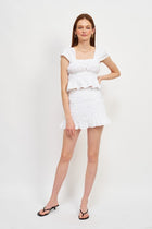 The Elodie Smocked Ruffle Mini Skirt