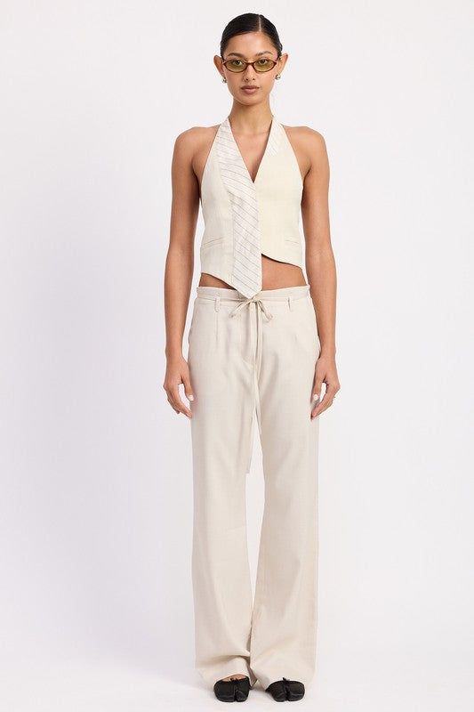 Emory Park wide leg drawstring trousers with belt loops in beige worn by a model with sleeveless top