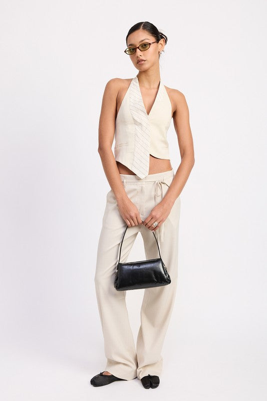 Emory Park beige wide leg drawstring trousers with belt loops styled with sleeveless halter top and black handbag