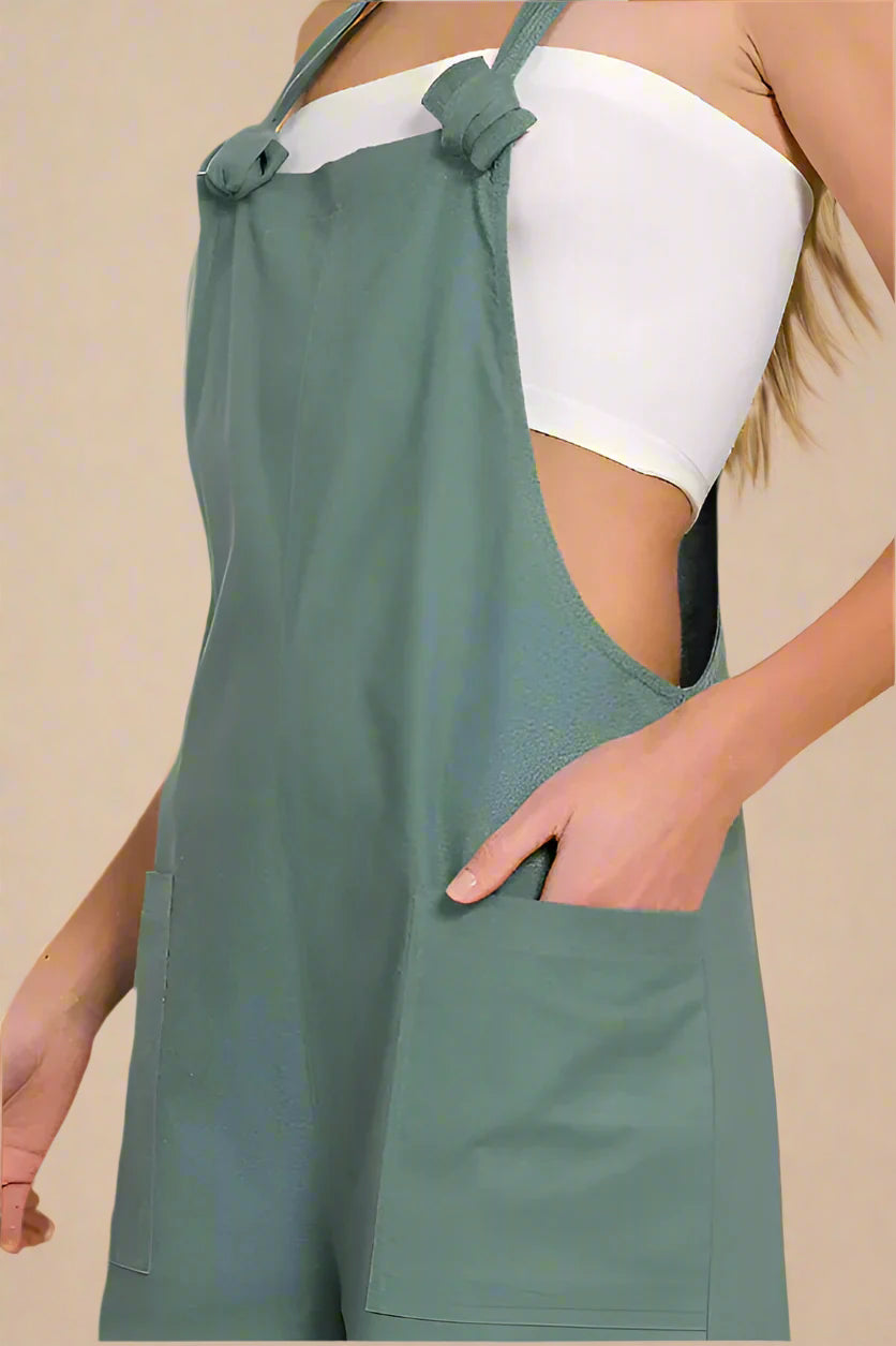 Woven Knot Strap Overalls in green with side pockets and a stylish casual design