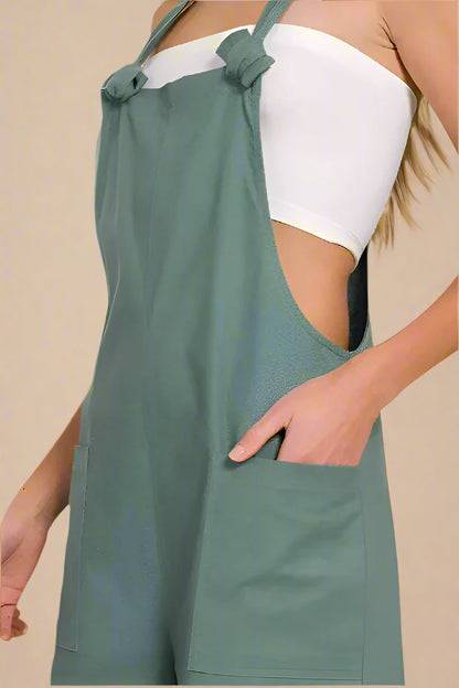 Woven Knot Strap Overalls in green with side pockets and a stylish casual design